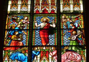 Stained-glass window featuring the scene of the Christ ascension